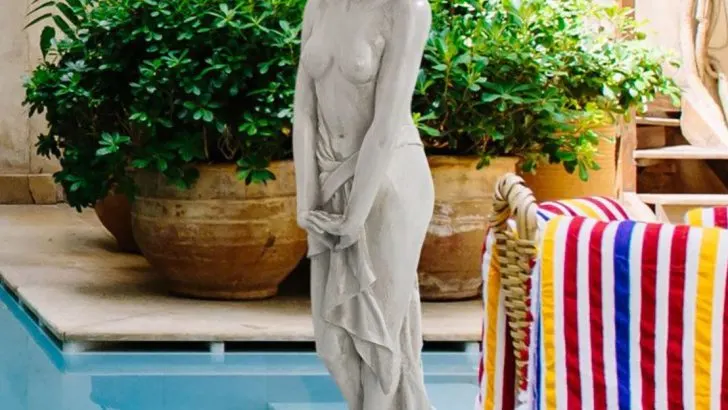 13 Perfectly Placed Garden Statues That Will Elevate Your Outdoor Design