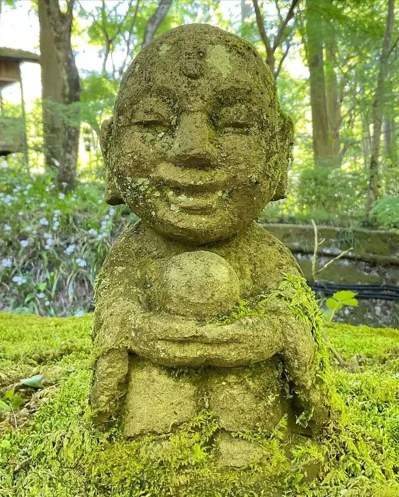 Moss-Covered Statues